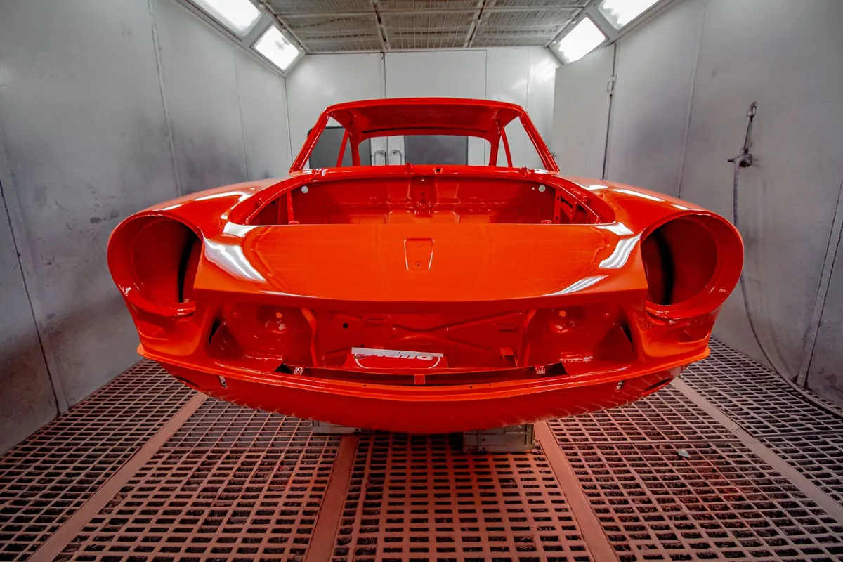 Freshly repainted car with showroom finish leaving the AutoFix paint booth in Rawalpindi
