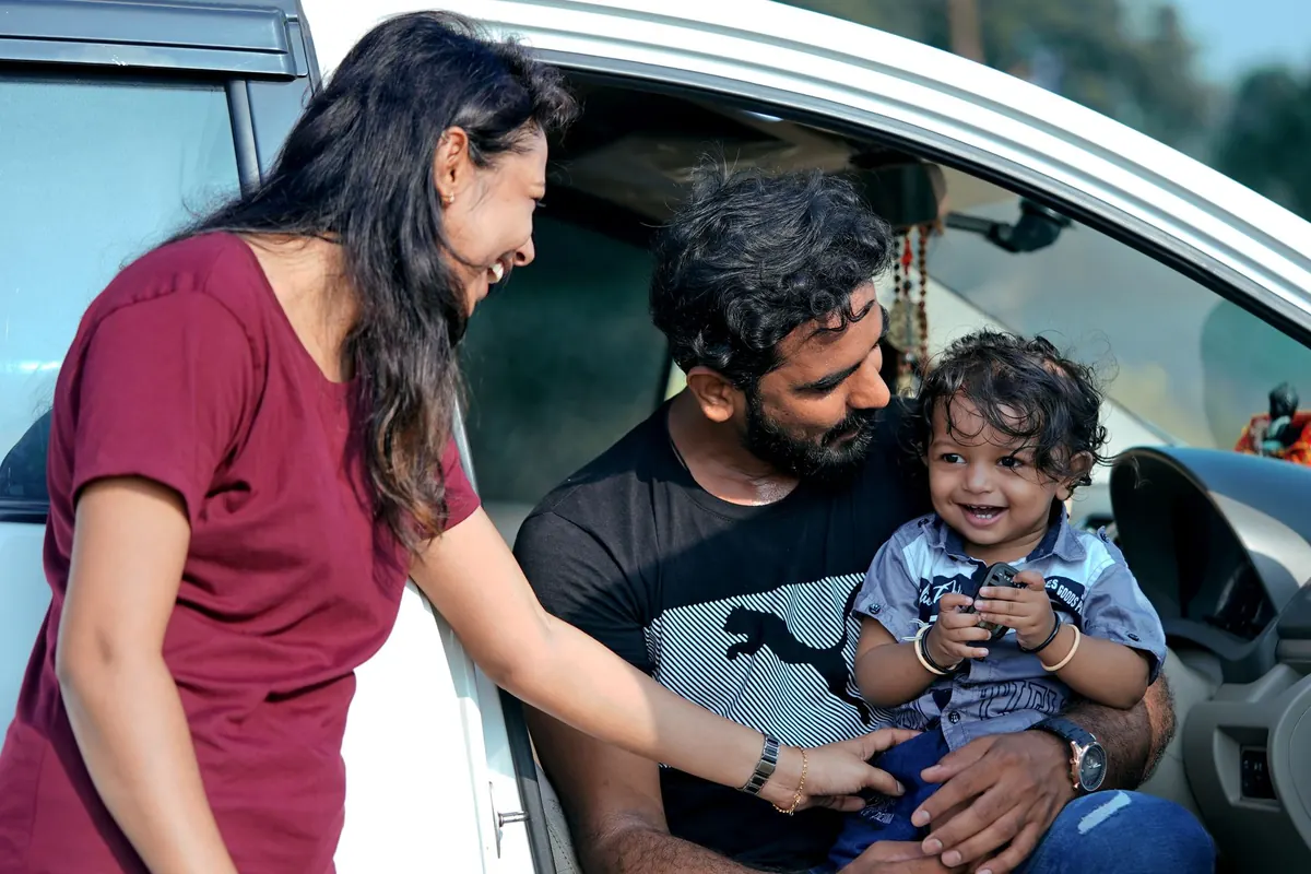 Happy family with their freshly serviced car β AutoFix doorstep car care Islamabad Rawalpindi